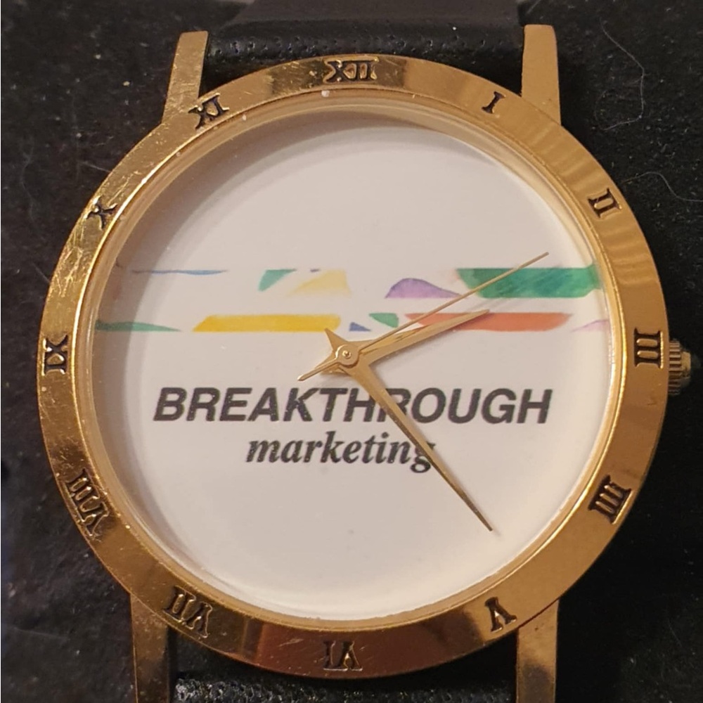 10/$20 Breakthrough Marketing by Image Watches Goldtone /White Leather Women's